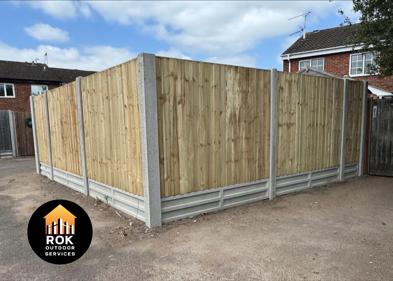 New timber boundary fencing with concrete posts and gravel boards